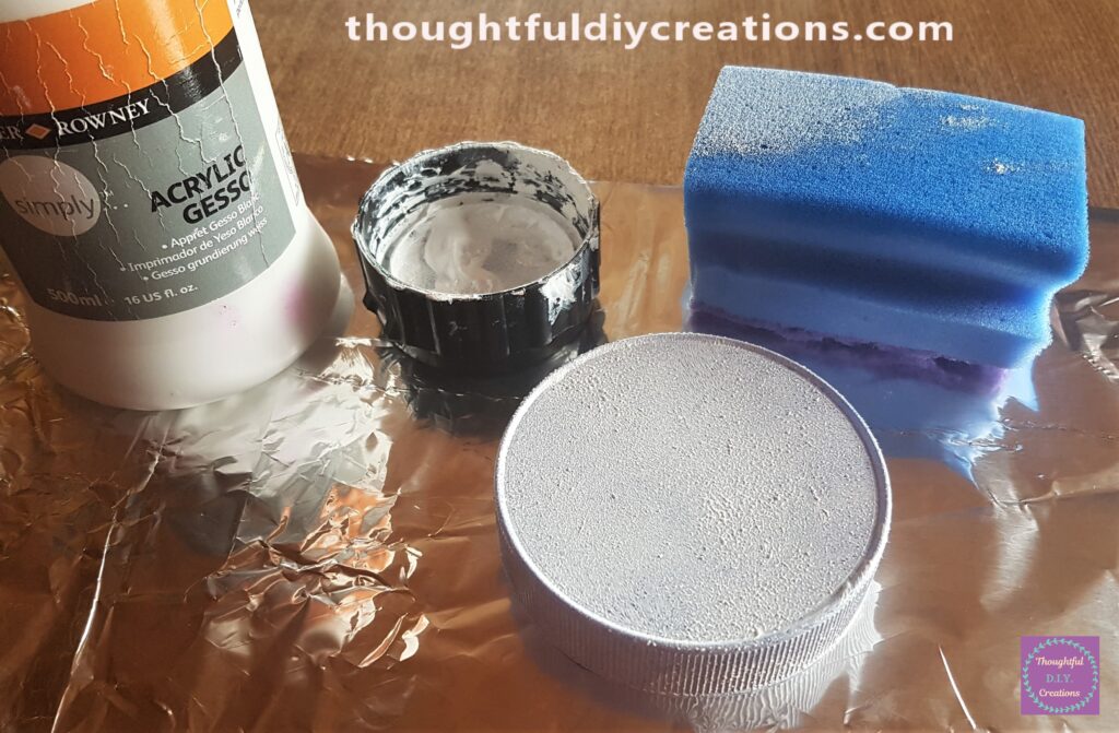 I got my Sponge and dipped it into the Gesso and dabbed it onto the Lid until it had 1 layer all over. This Primes it and helps paint adhere better to the surface.