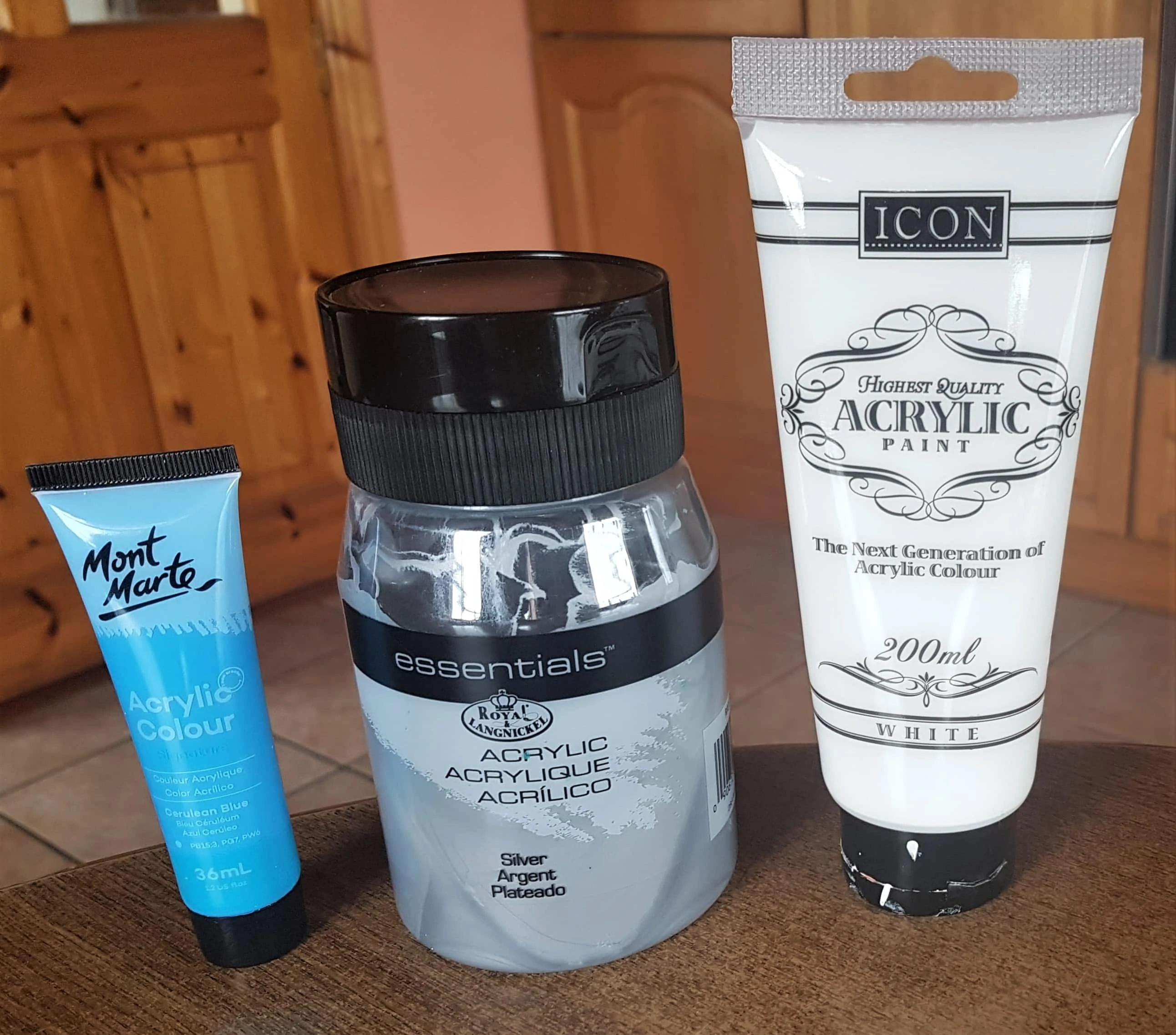 Light Blue, Silver and White Acrylic Paint.