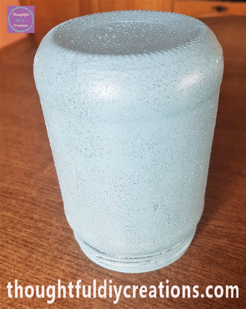 A full even layer of Paint all over the Jar. I put it on the Table to dry.