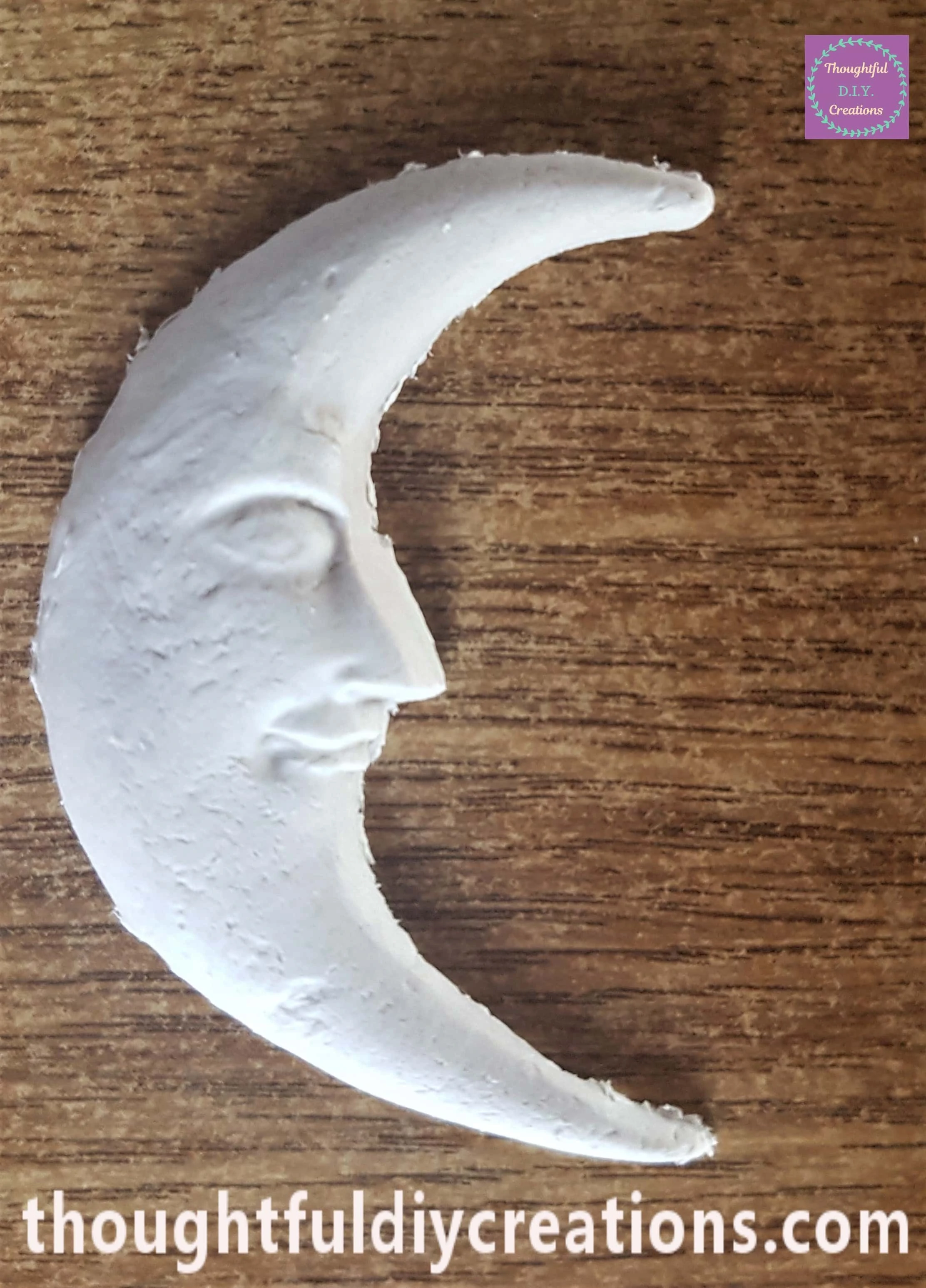 I turned the Mould upside down and pressed the back of the Moon to carefully remove the Clay Moon.