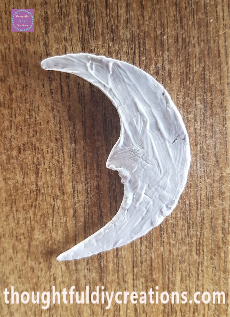 A nice amount of the Glue all over the back of the Moon.