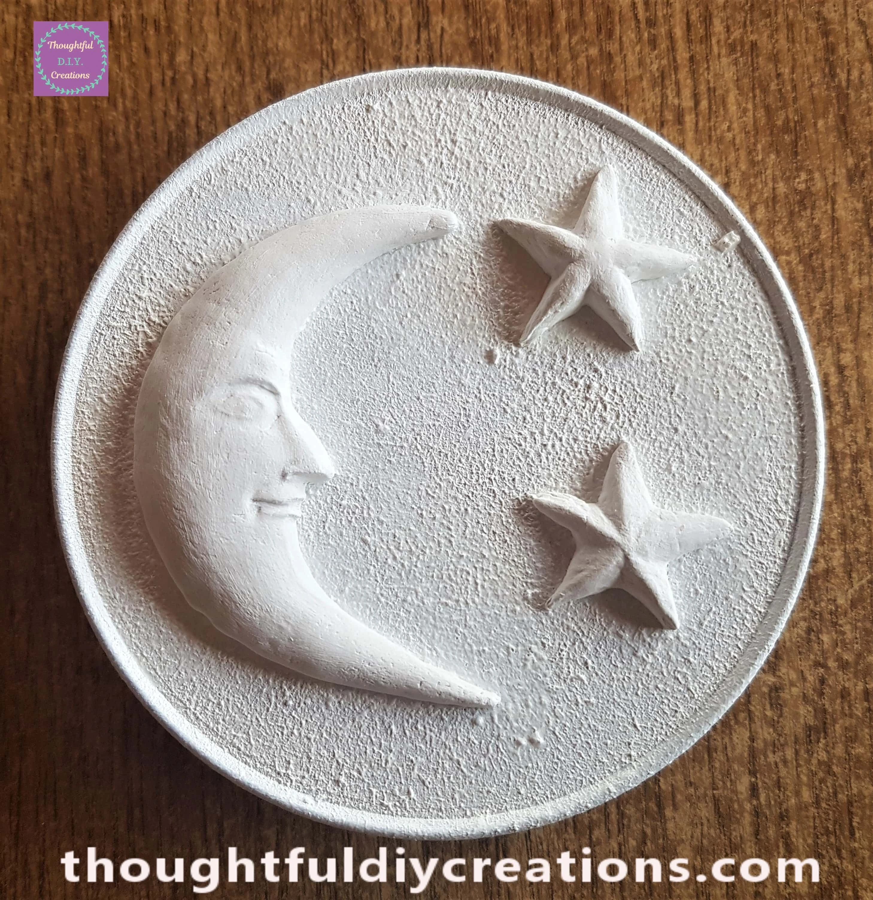 I added a layer of white gesso to the moon and stars on the lid to prime them.