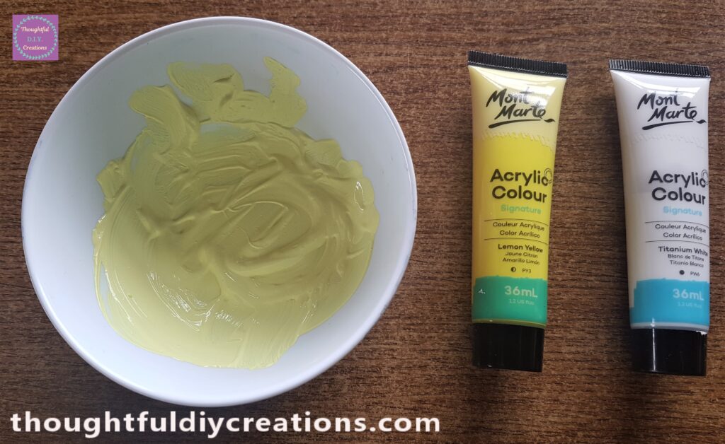 I mixed white paint with yellow to make a paler shade of yellow.