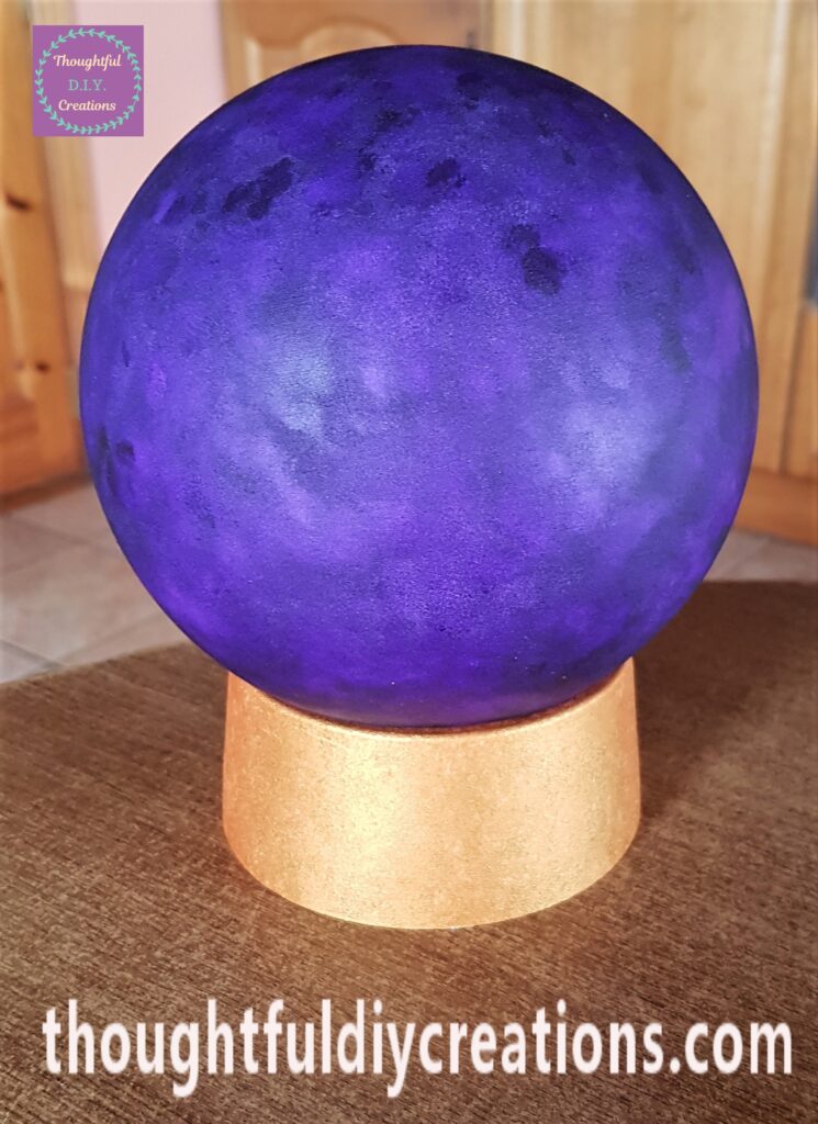 I twisted the bulb back into the stand when the paint was dry.