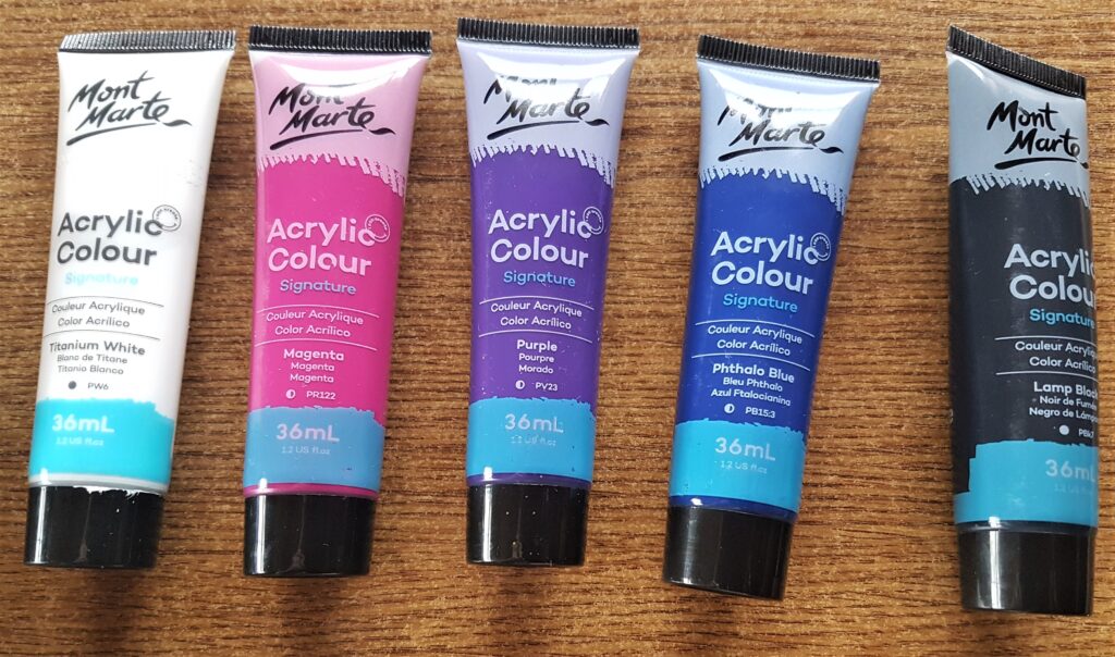 The colours of the acrylic paints to paint the galaxy were; white, magenta, purple and dark blue. The black was used as a base layer.