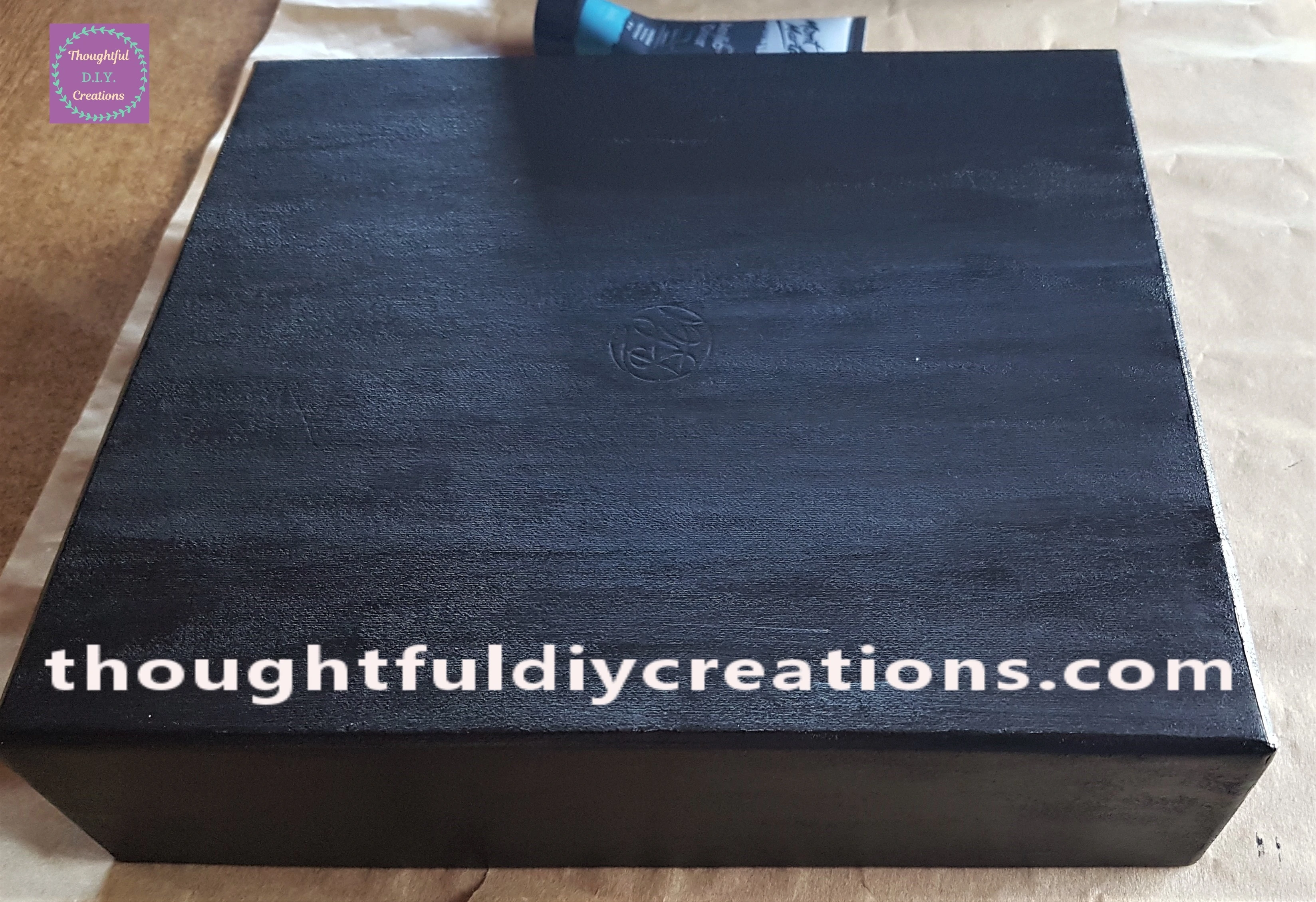 I also applied a layer of the black paint to the lid.