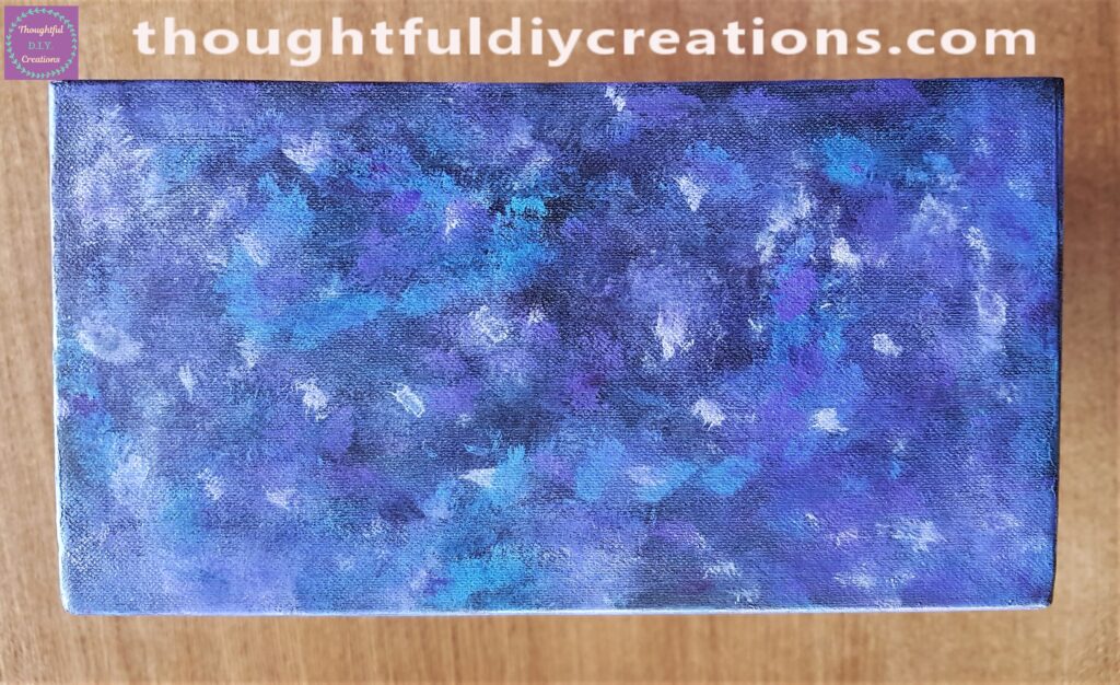 I added blobs of white paint and blended them into the box.