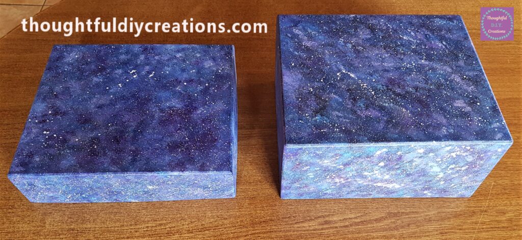 Lid beside the box with white splatters added to every side of each piece.