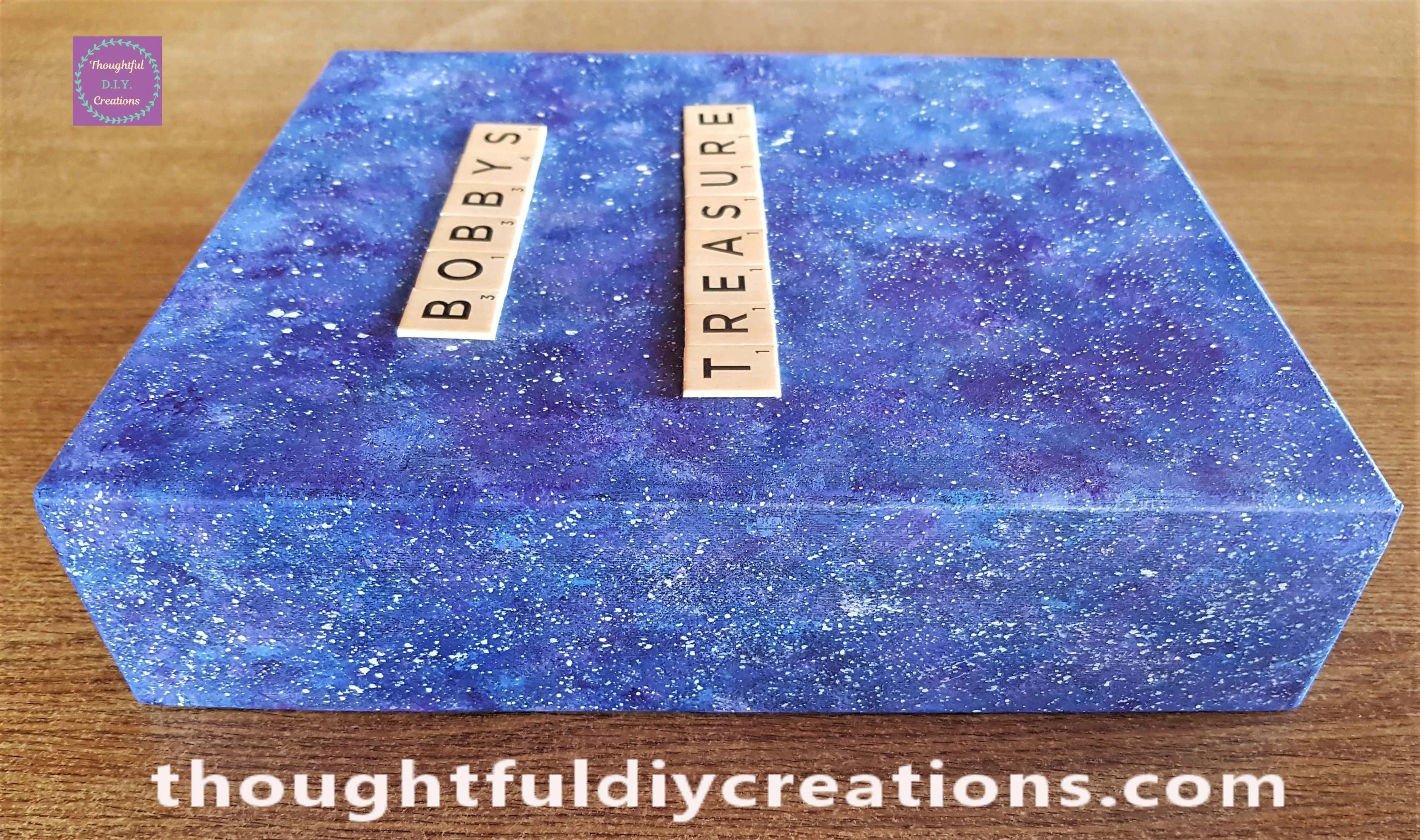 A side angle of the lid after the scrabble letters were attached.