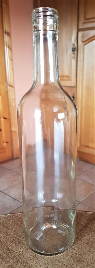 The Wine Bottle after being soaked in the sink, label removed, rinsed and dried.