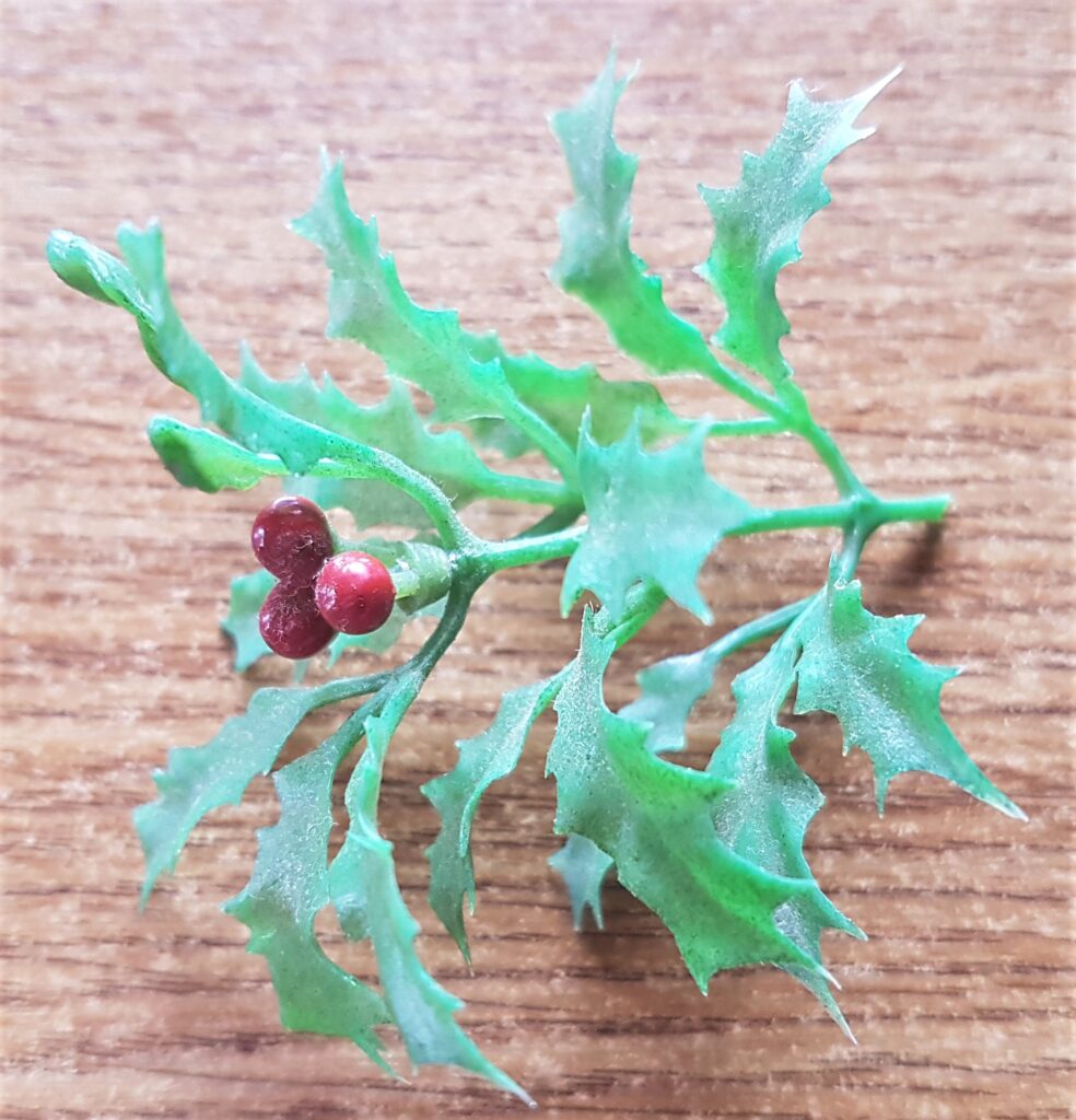 I cut a section of Holly to decorate the Frosted Glass Bottle.