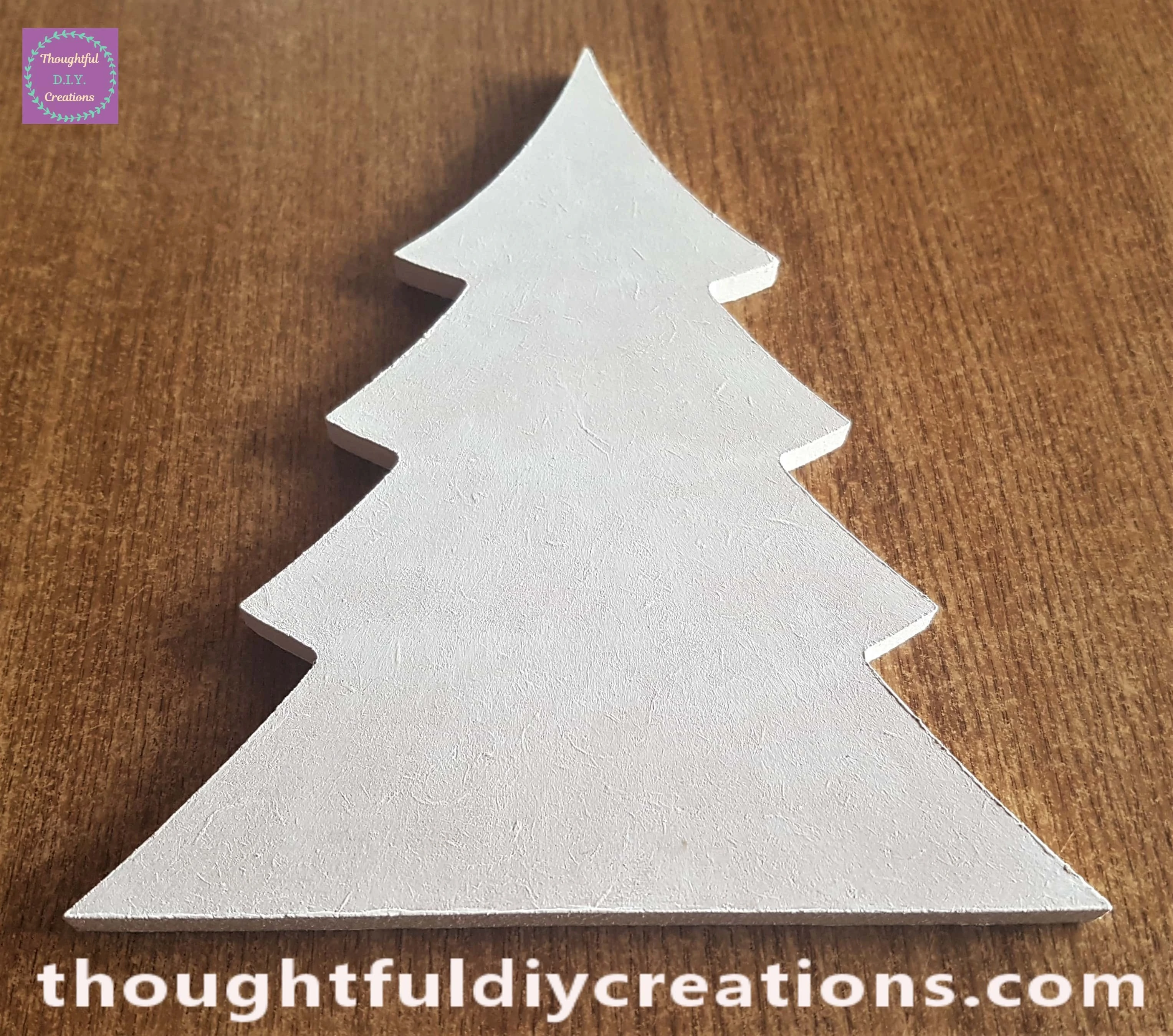 I painted 2 layers of Gesso all over the Tree leaving an hour between layers. This primes the surface.