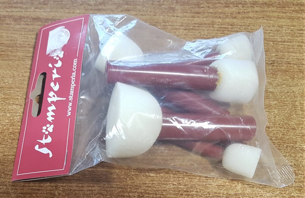 Set of sponges with handles.