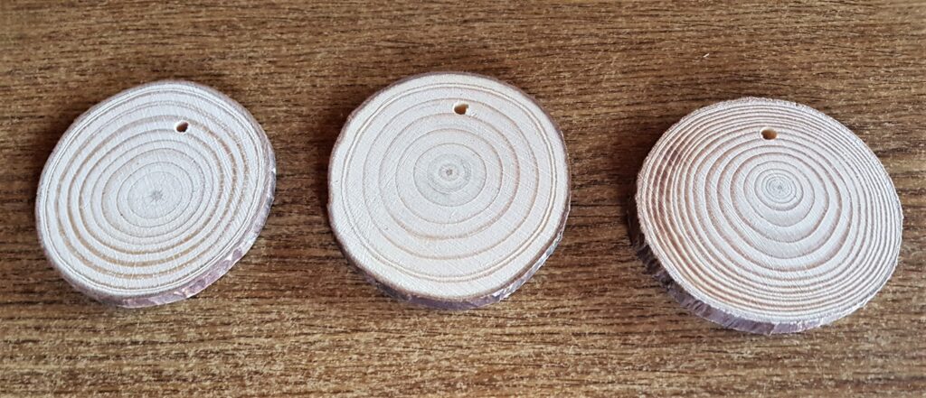 3 of the wood slices out of the box.