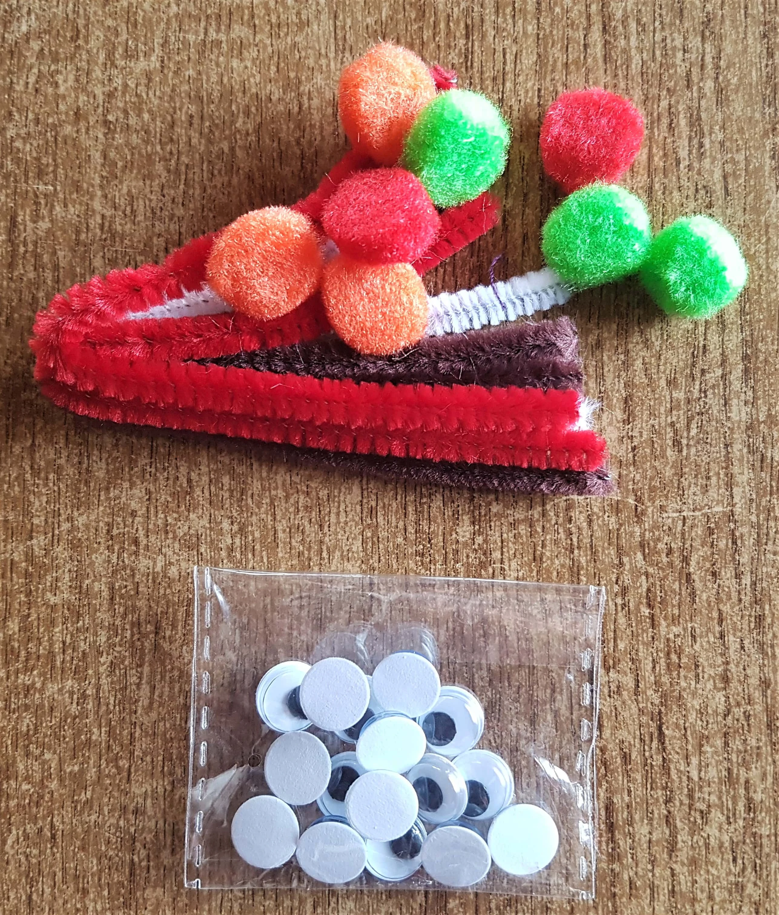 Pipe Cleaners, Pom poms and Googly Eyes from a Christmas Pack.