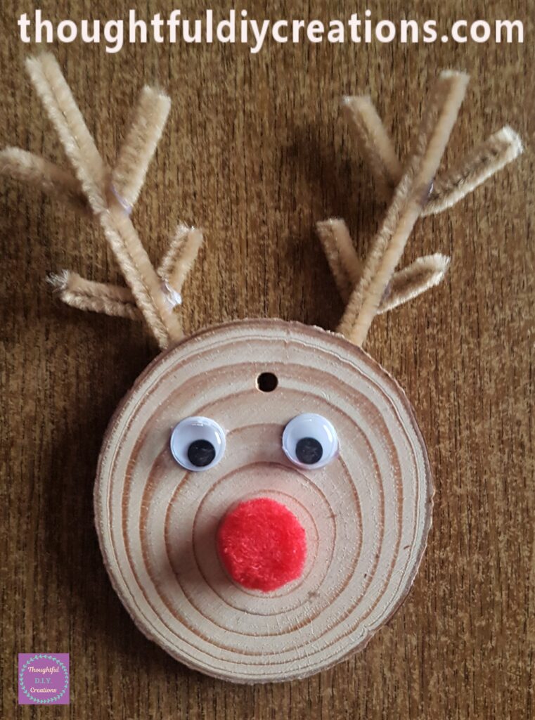 I put hot glue into the center of the pipe cleaners and attached them to the first pipe cleaners.