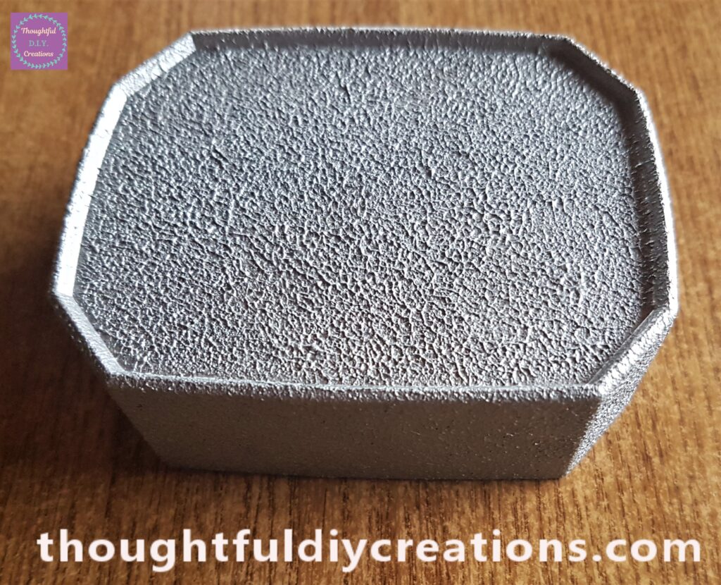I Painted 2 layers of Silver Paint all over the Lid with a Sponge. I waited an hour between layers.