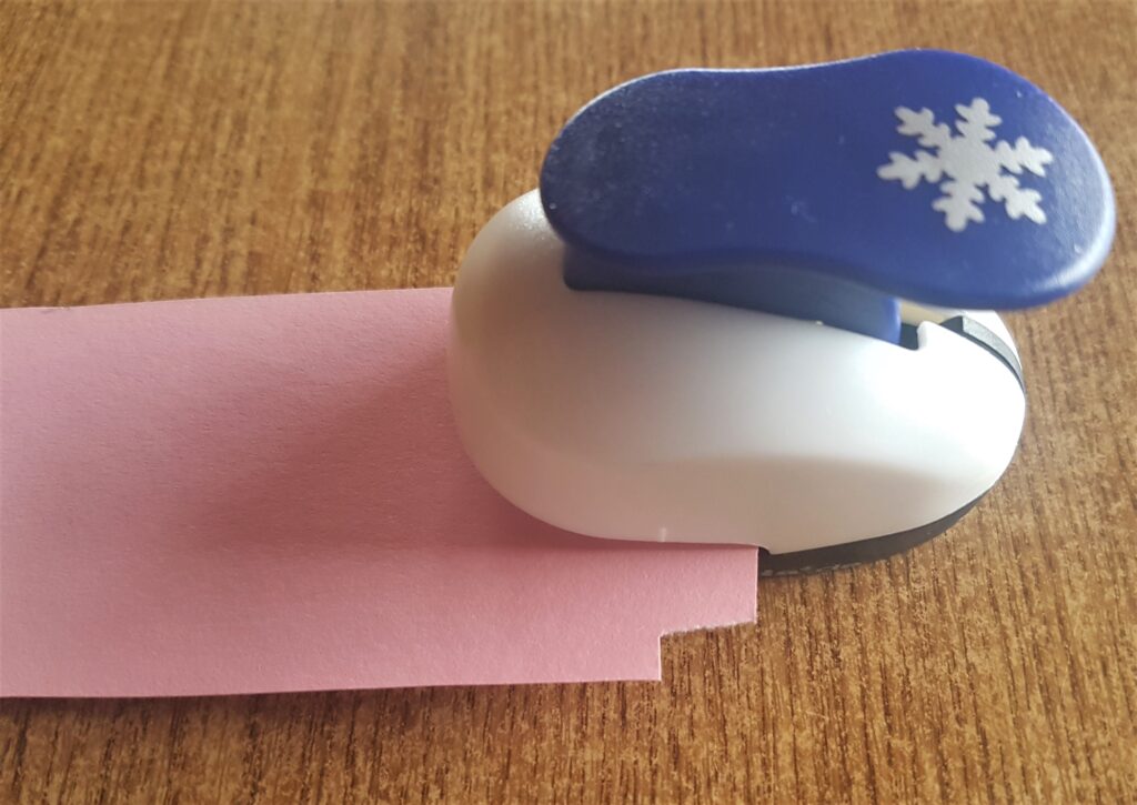 I also punched snowflakes out of light pink paper.