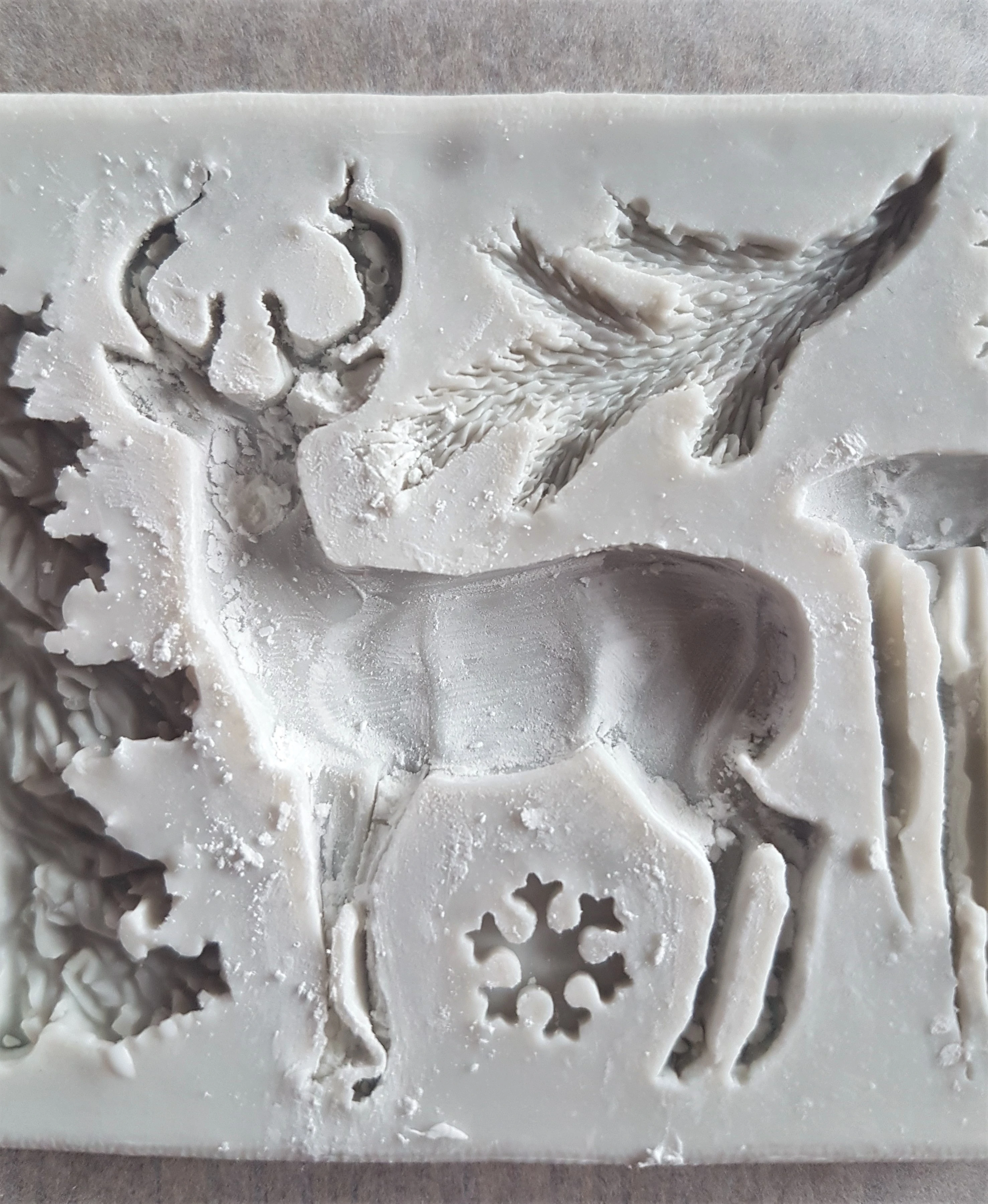 I sprinkled some Cornflour into the Deer Mould. This makes it easier to remove the Clay from the Mould.