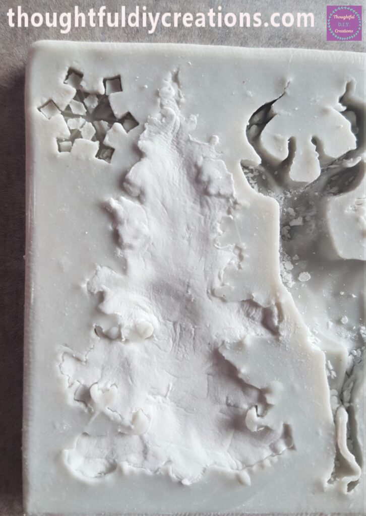 I put Cornflour into the Tree Mould and then added Clay until it was covered.