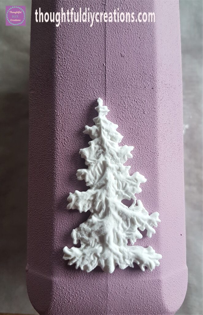 I attached the second of the Christmas Clay Moulds to the side of the Jar.
