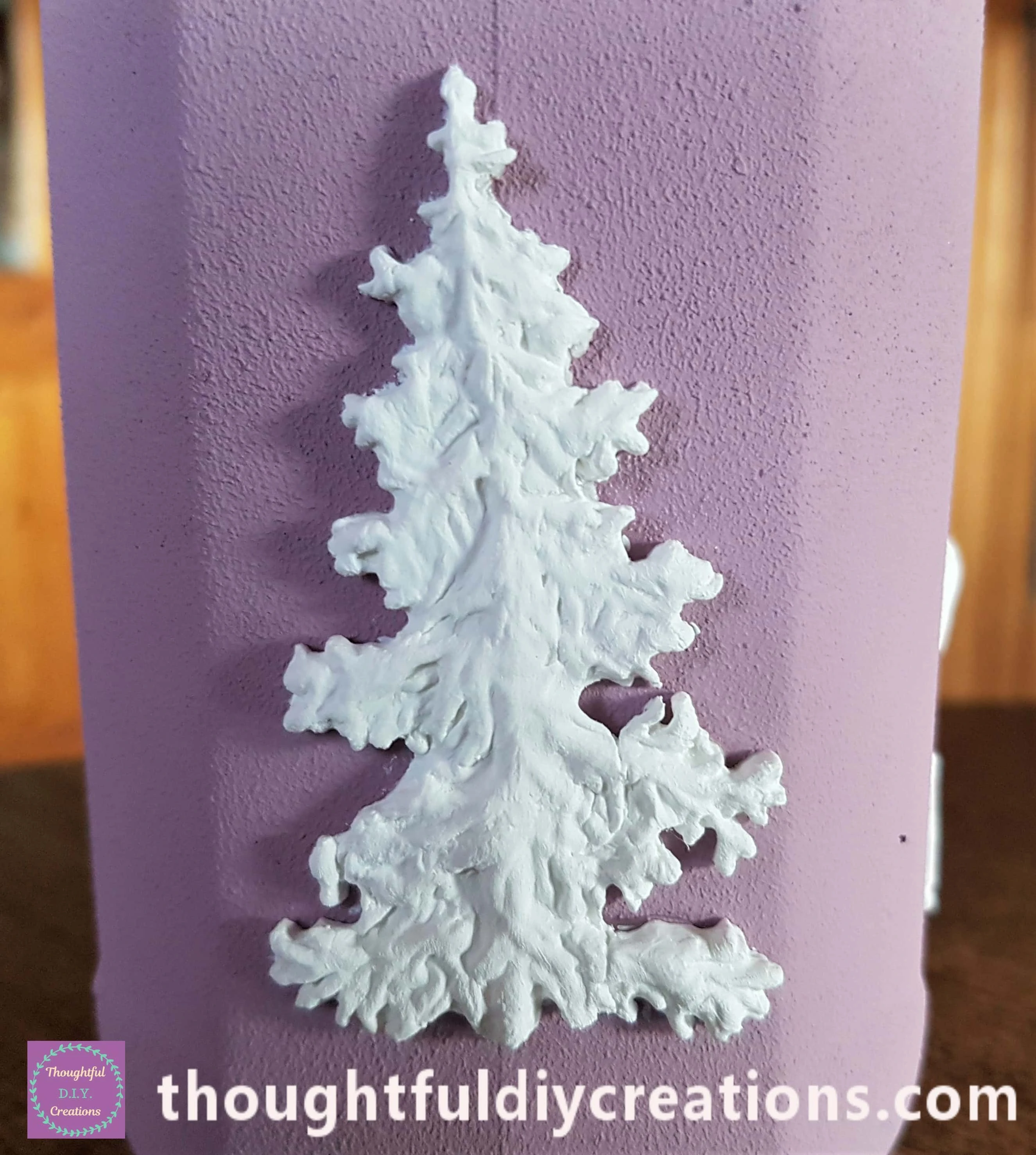 One layer of Acrylic White Gesso applied to the Christmas Clay Moulds. A close-up of the Tree after being Primed.