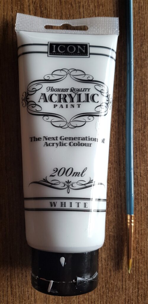Acrylic White Paint and a small Paintbrush.