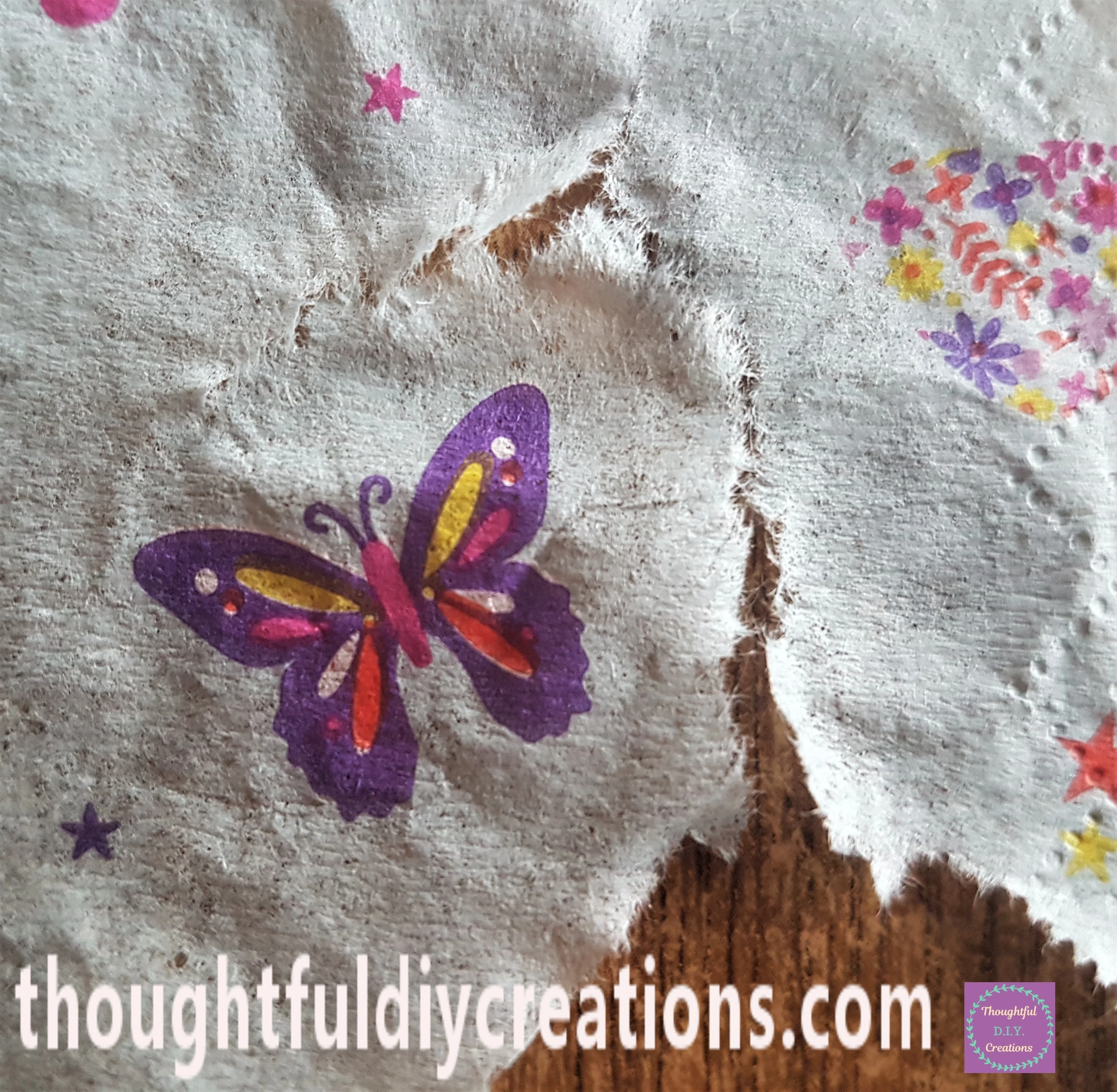 I tore around the Butterfly, I had 1 hand on the butterfly and tore outwards with my other hand to ensure I wouldn't rip the Butterfly.