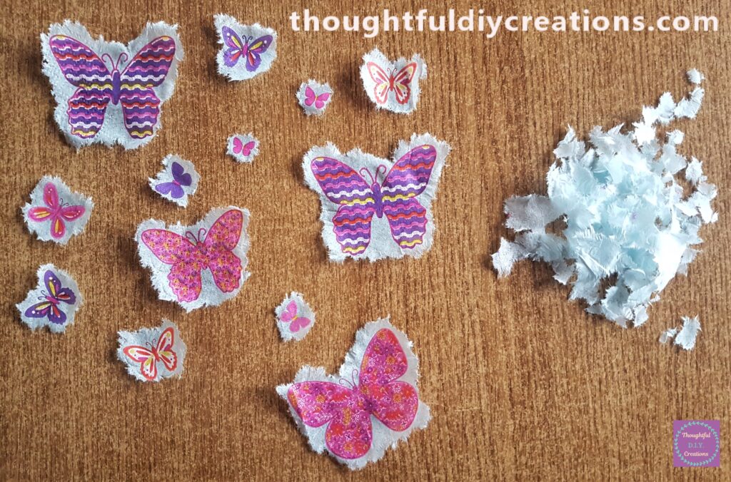 I tore around each butterfly again, it will be less napkin to glue to the page.