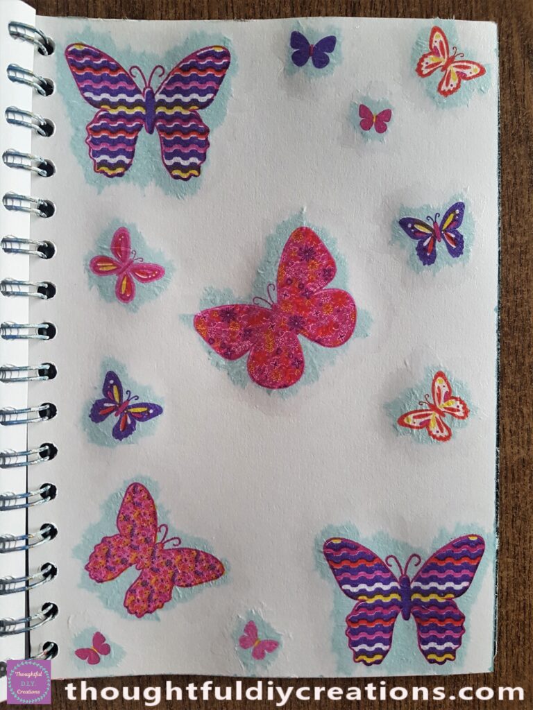 I finished with the Decoupage by adding 5 more butterflies to the Page.