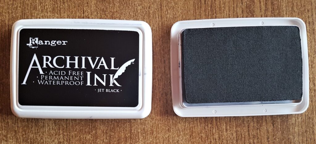 I got my Black Archival Ink Pad and opened it up.
