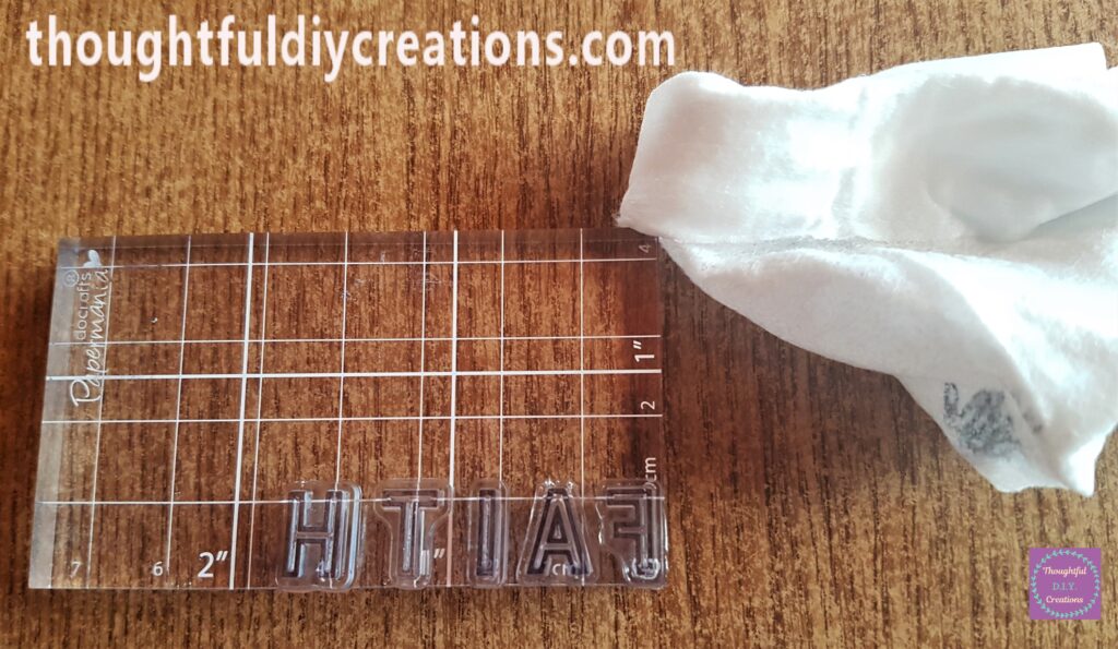 I wiped the excess Ink off each Stamp using a Baby Wipe.