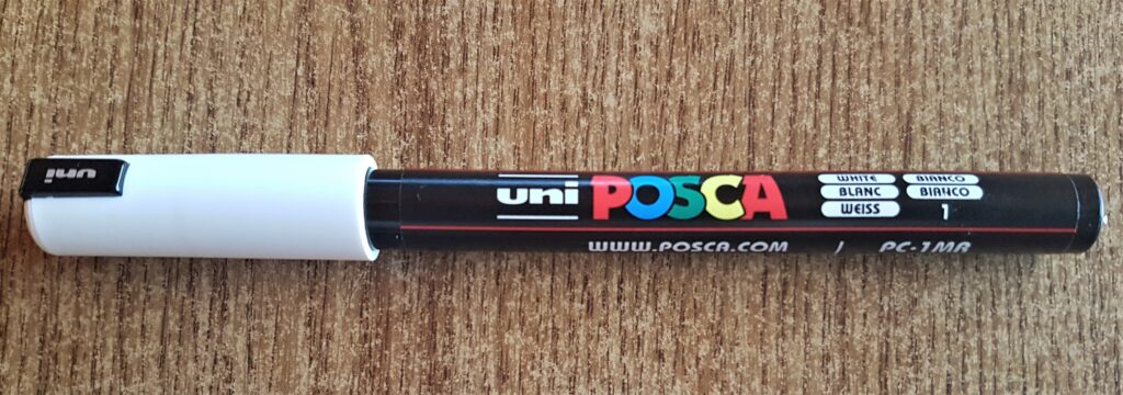 uni POSCA Acrylic Paint Pen in White 0.7 mm.