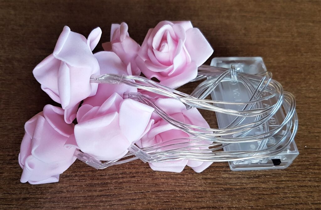 Pink Light-Up Roses, Battery Pack, String Lights.