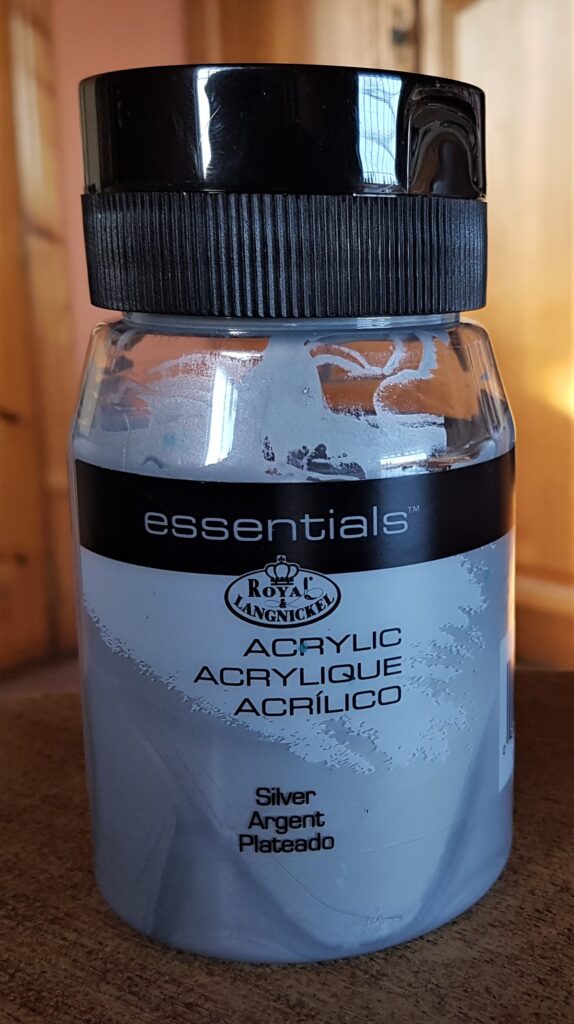 Tub of Silver Acrylic Paint.