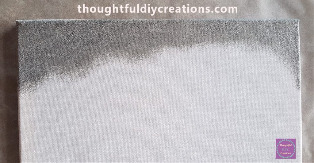 I added more Paint to the Sponge and dabbed it onto the Top of the Canvas.