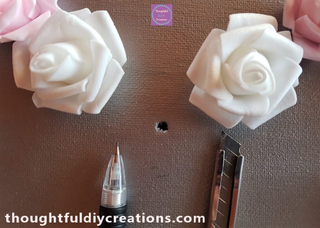 I used a Blade to make the Hole in the Canvas.