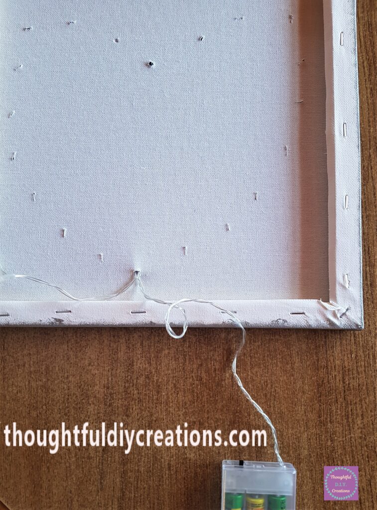 I started with the Light closest to the Battery Pack and poked it through the Hole in the Bottom of the Heart.