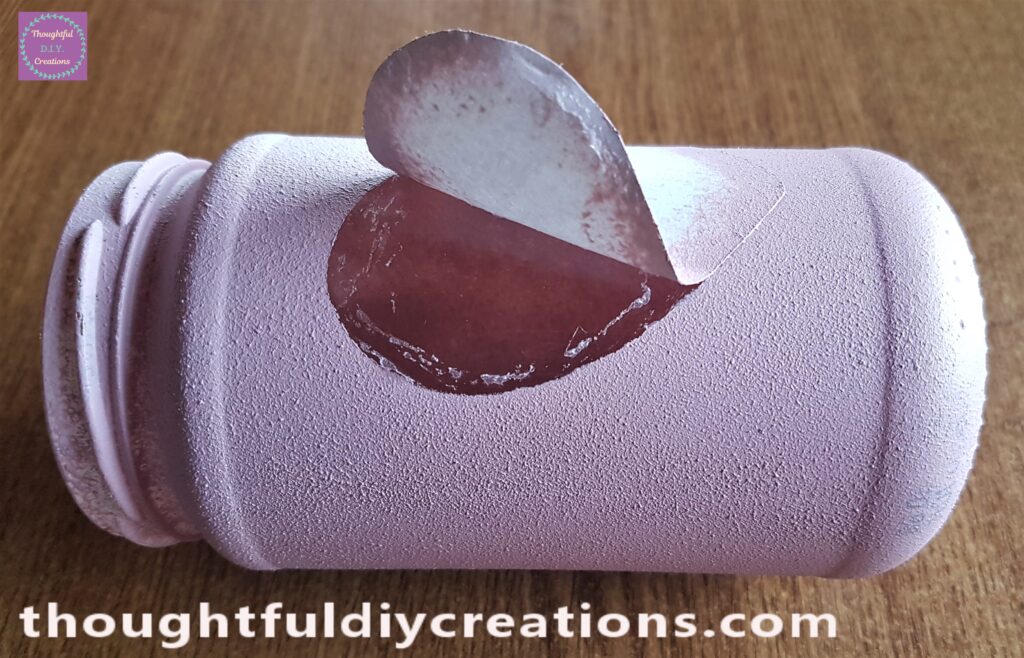 I began to peel back the Heart Template from the Pink Jar.