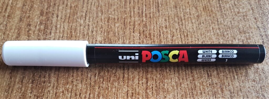 White uni POSCA Acrylic Paint Pen 0.7mm.