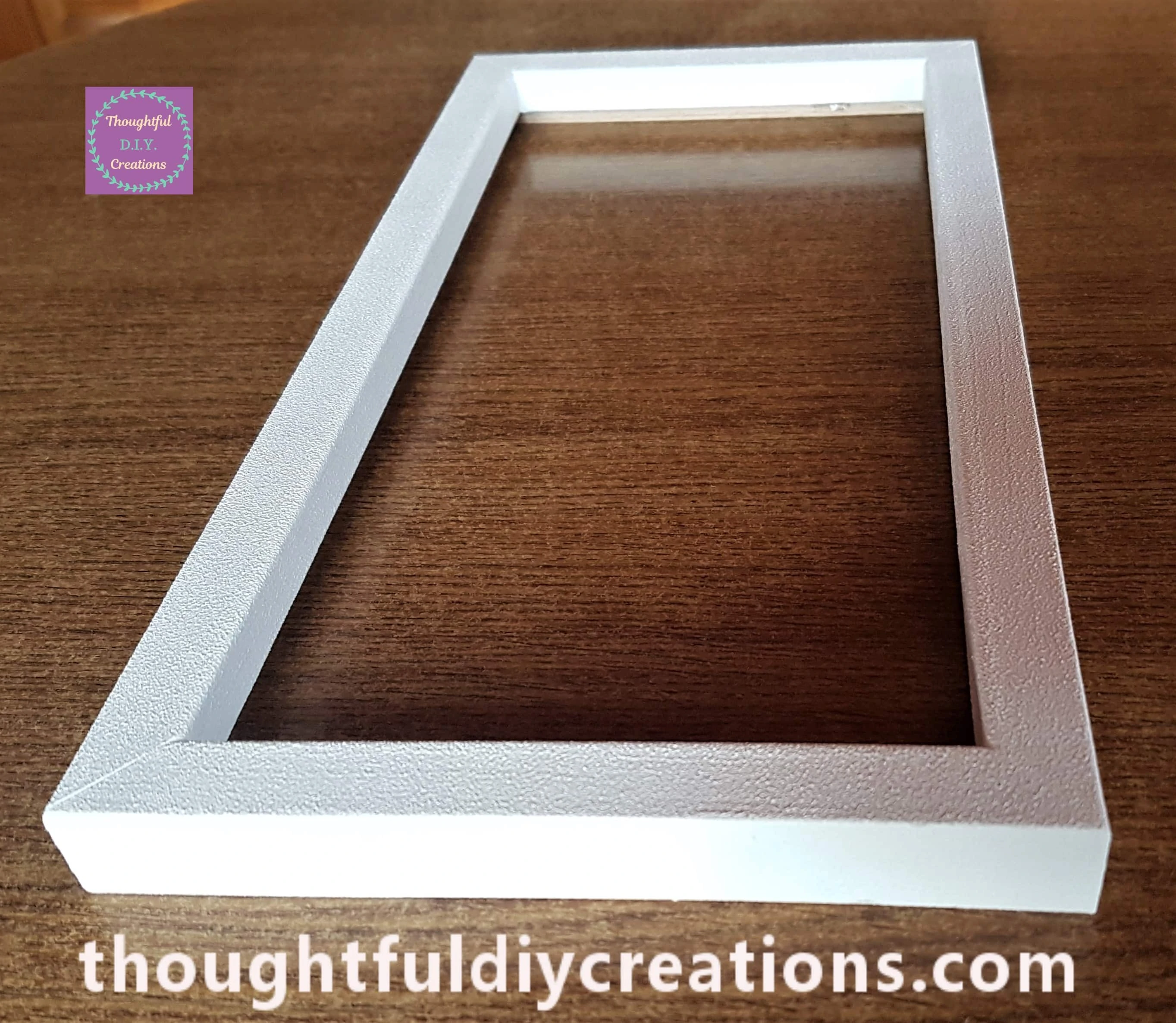 A Side angle of the Frame after 3 coats of paint were applied and dried.