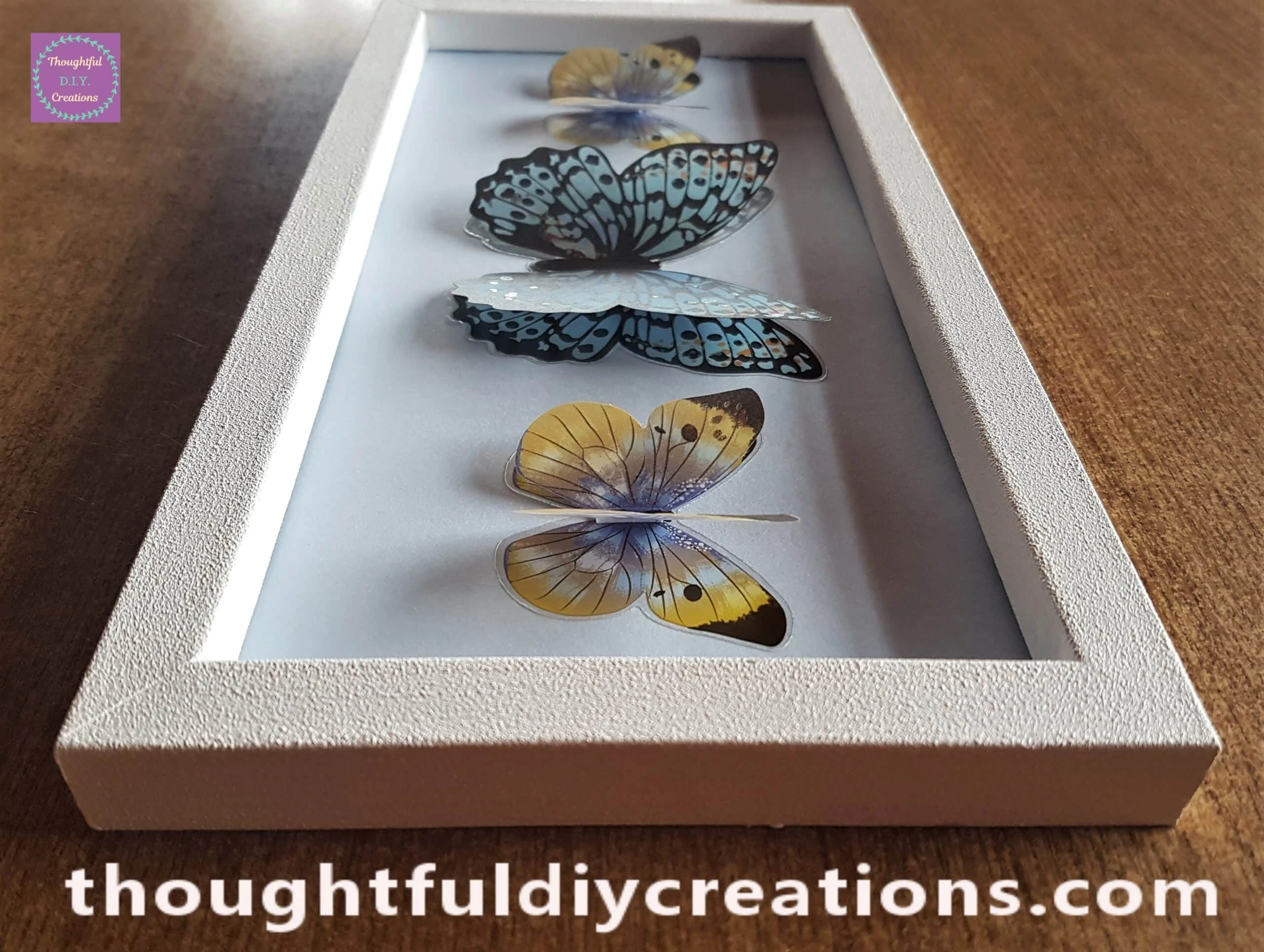 Side angle showing the 3-D wings of each butterfly.