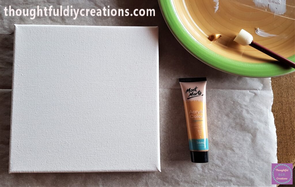 Gold Acrylic Paint and Flat Sponge with Handle. I put Baking Paper on the Table to protect it.