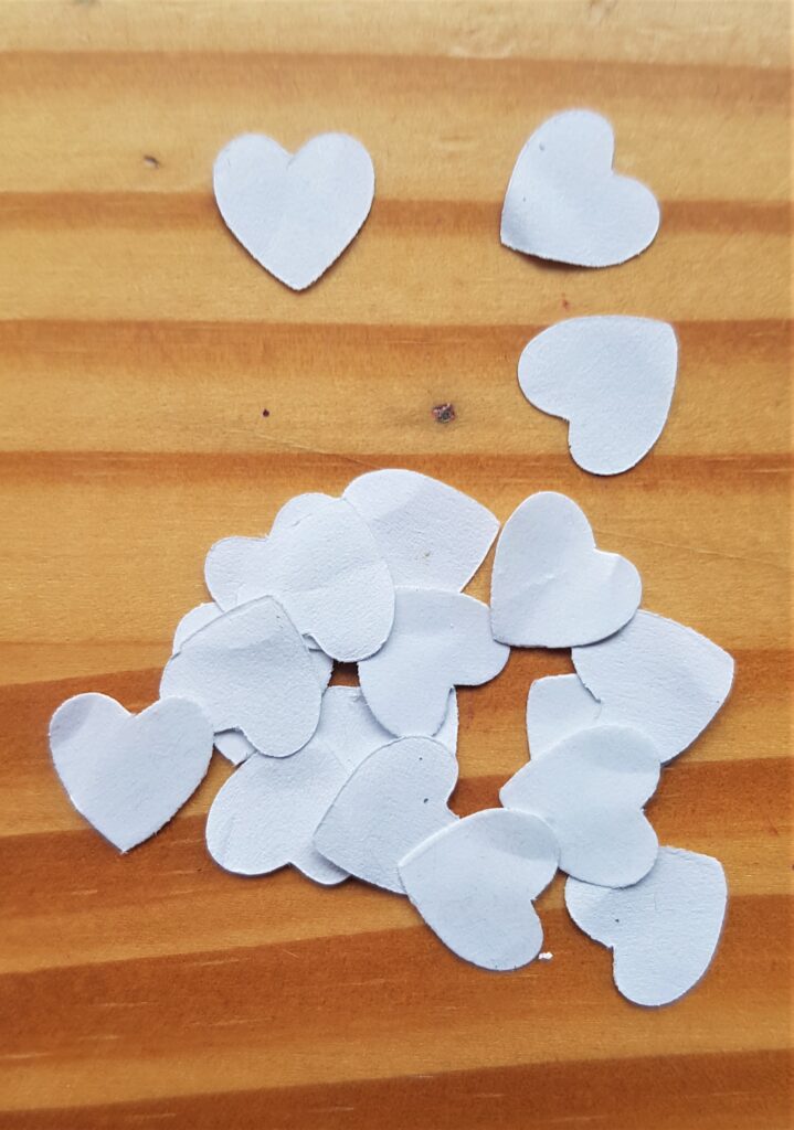 I removed the backing from each of the Heart Stickers.