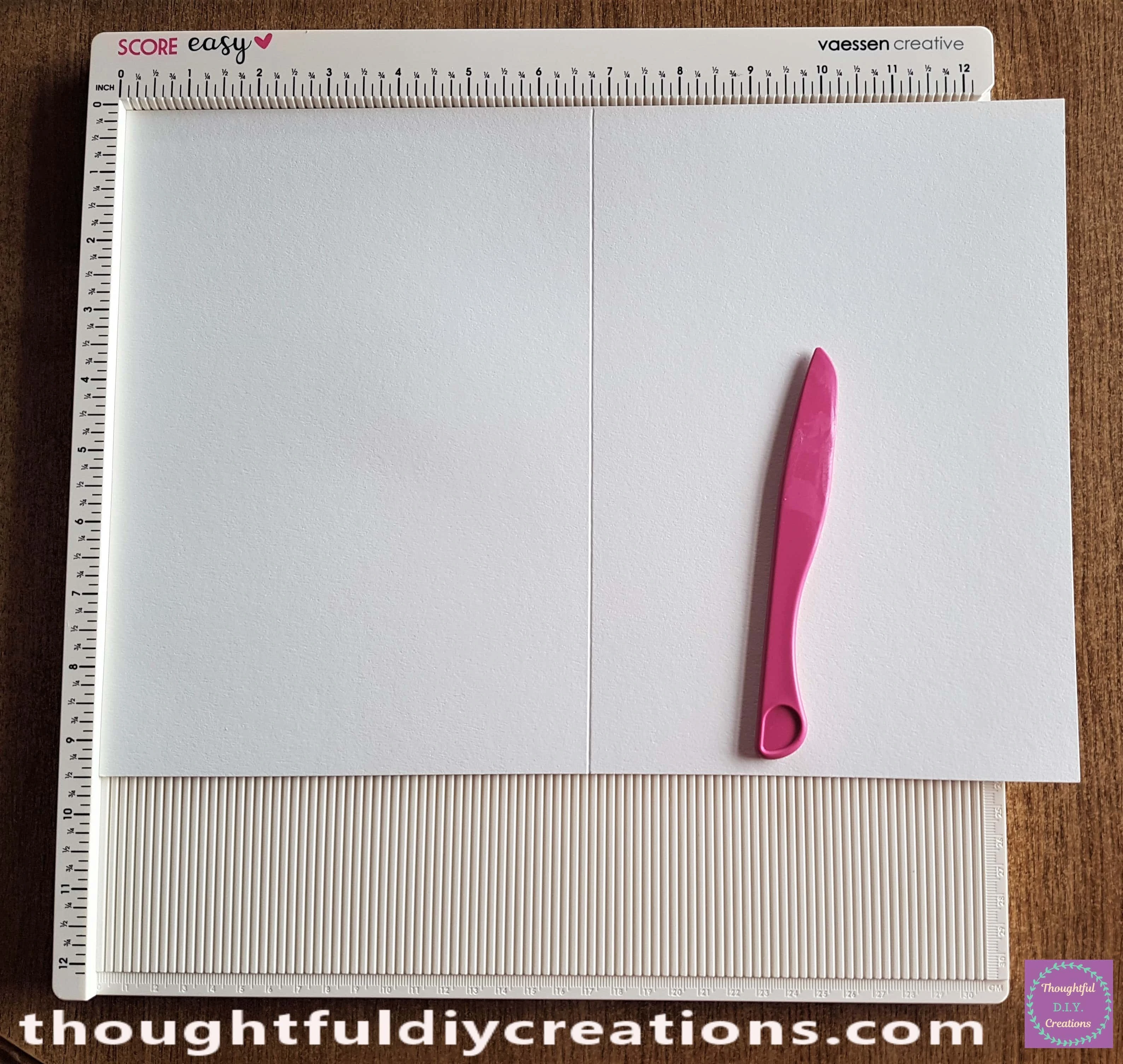 I Scored a Line down the center of the Cardstock.