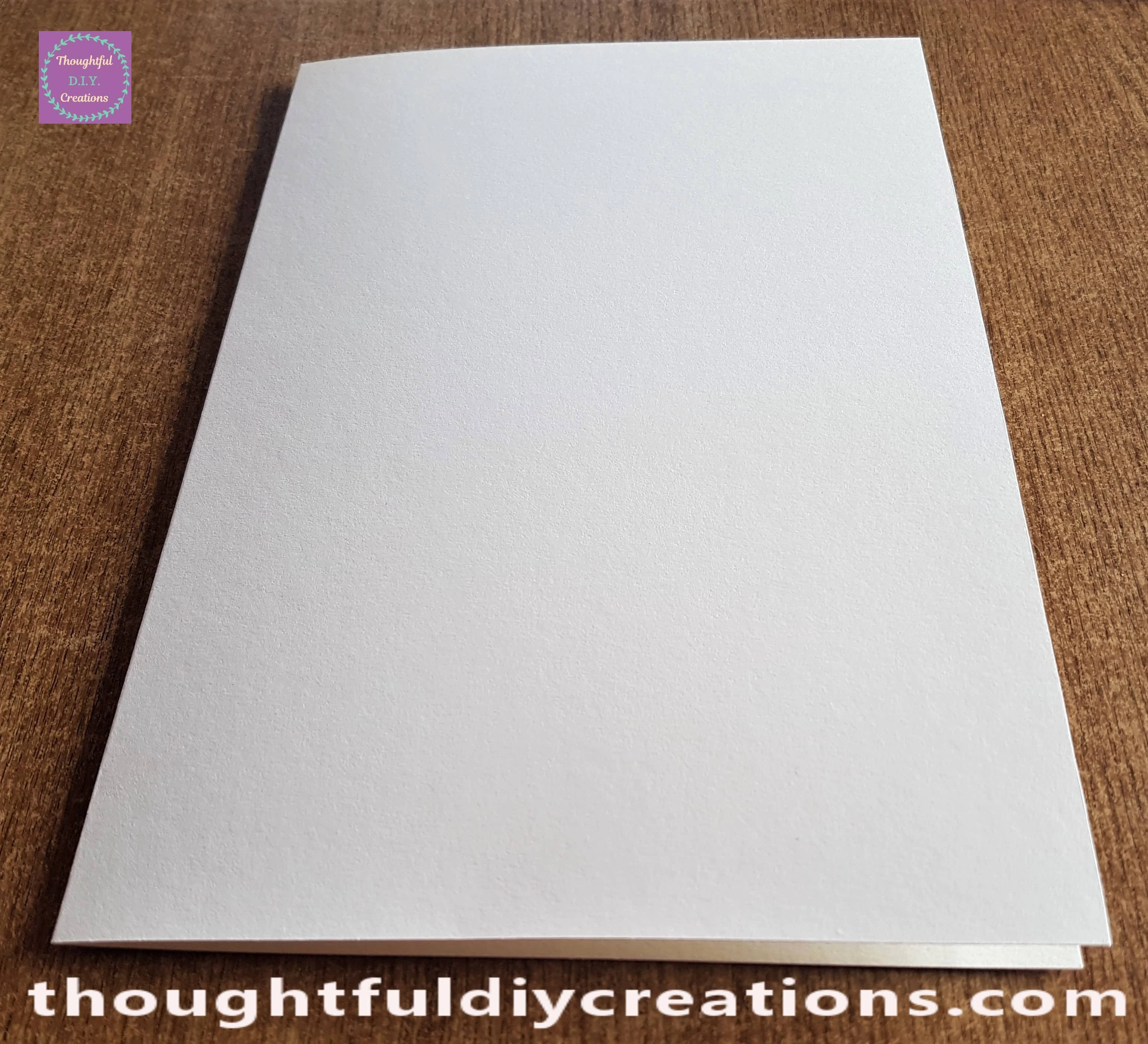 I folded the Card in half and pressed the folded line across with the bone folder.