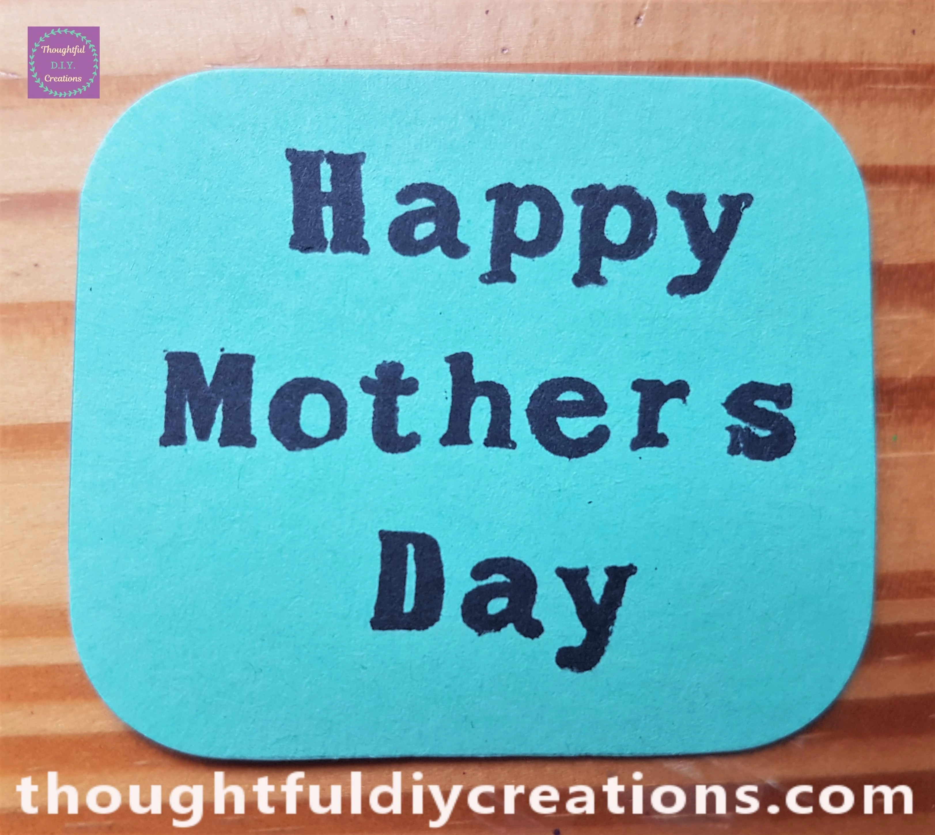 I put the Corner of the Green Card into the Inner Part of the Corner Punch and pressed the Punch down to Round the Corners of the Card.