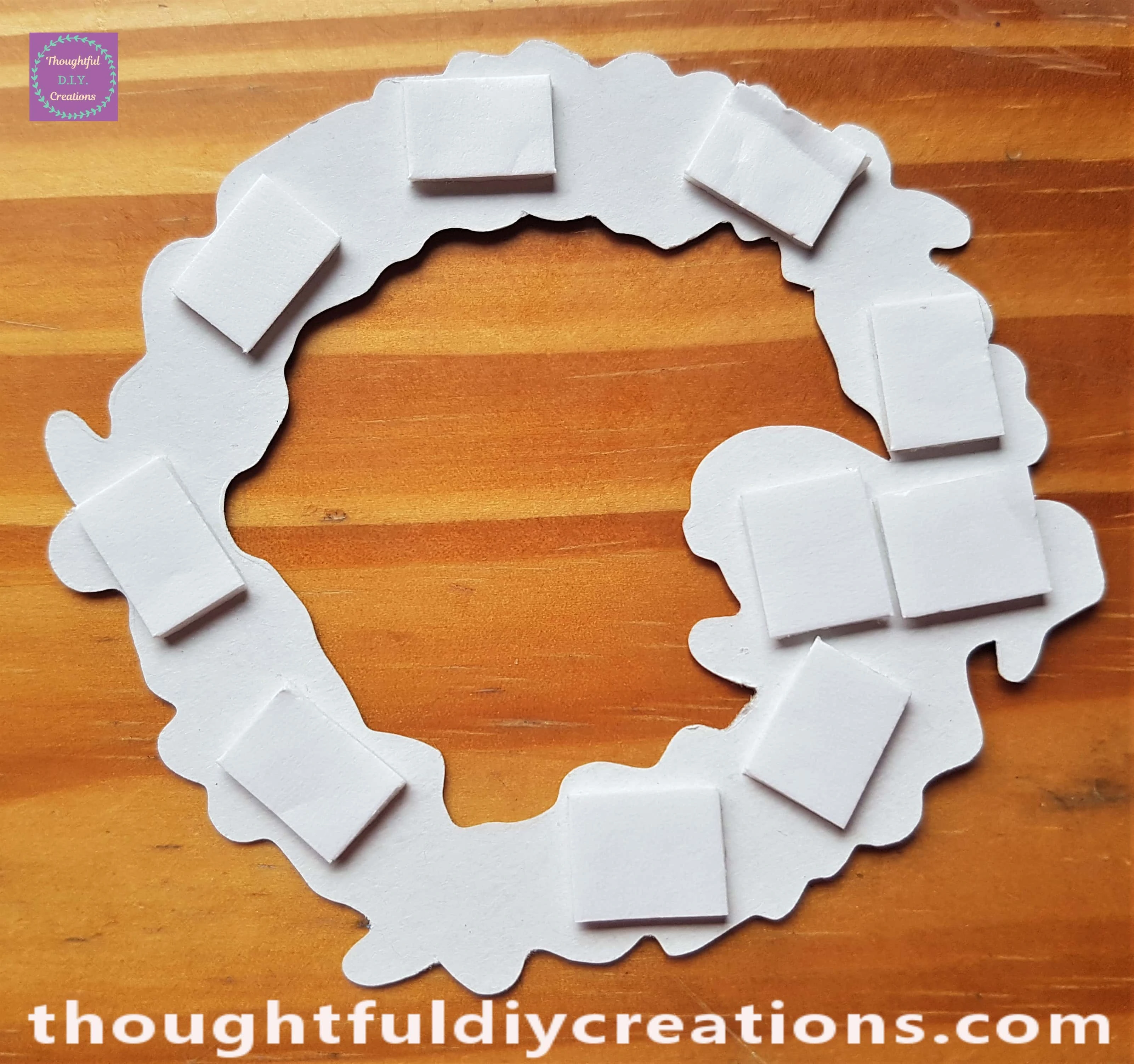 I put the Foam Squares on the back of one of the Elements.