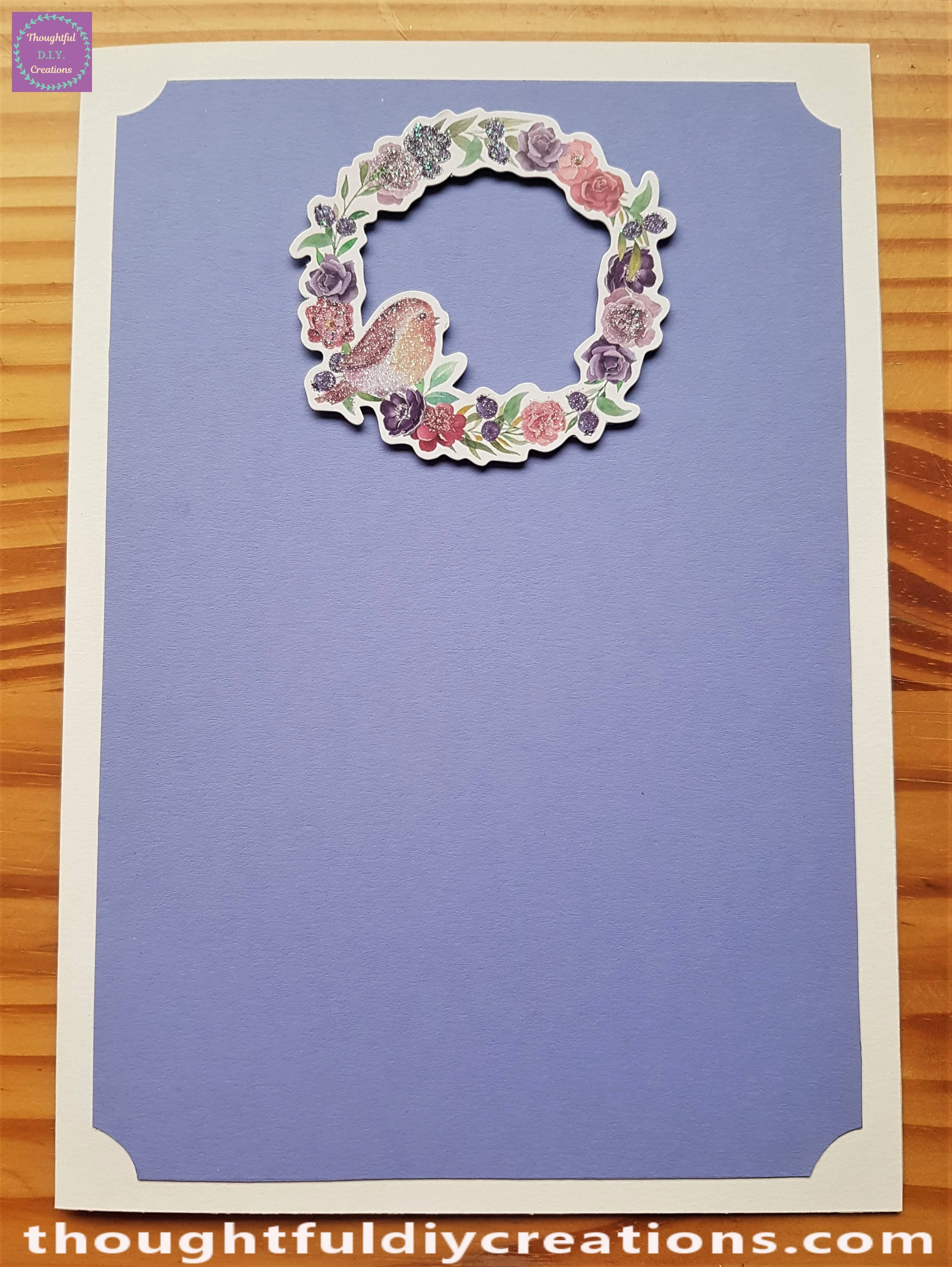 I removed the white backing from the foam pieces and attached the 3-D element to the Card.