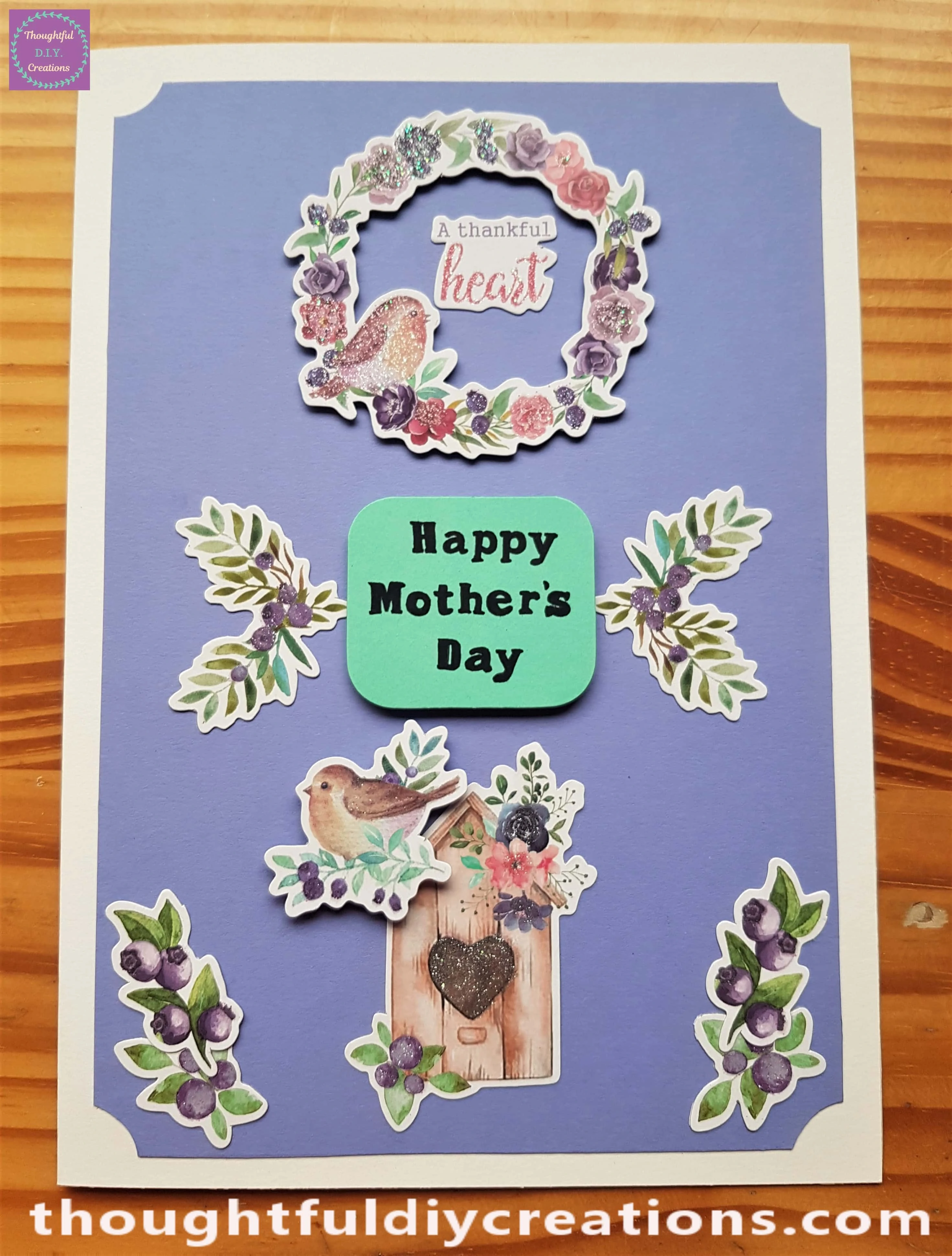 Two matching Berry Leaves were added to the Card with Pritt Stick.
